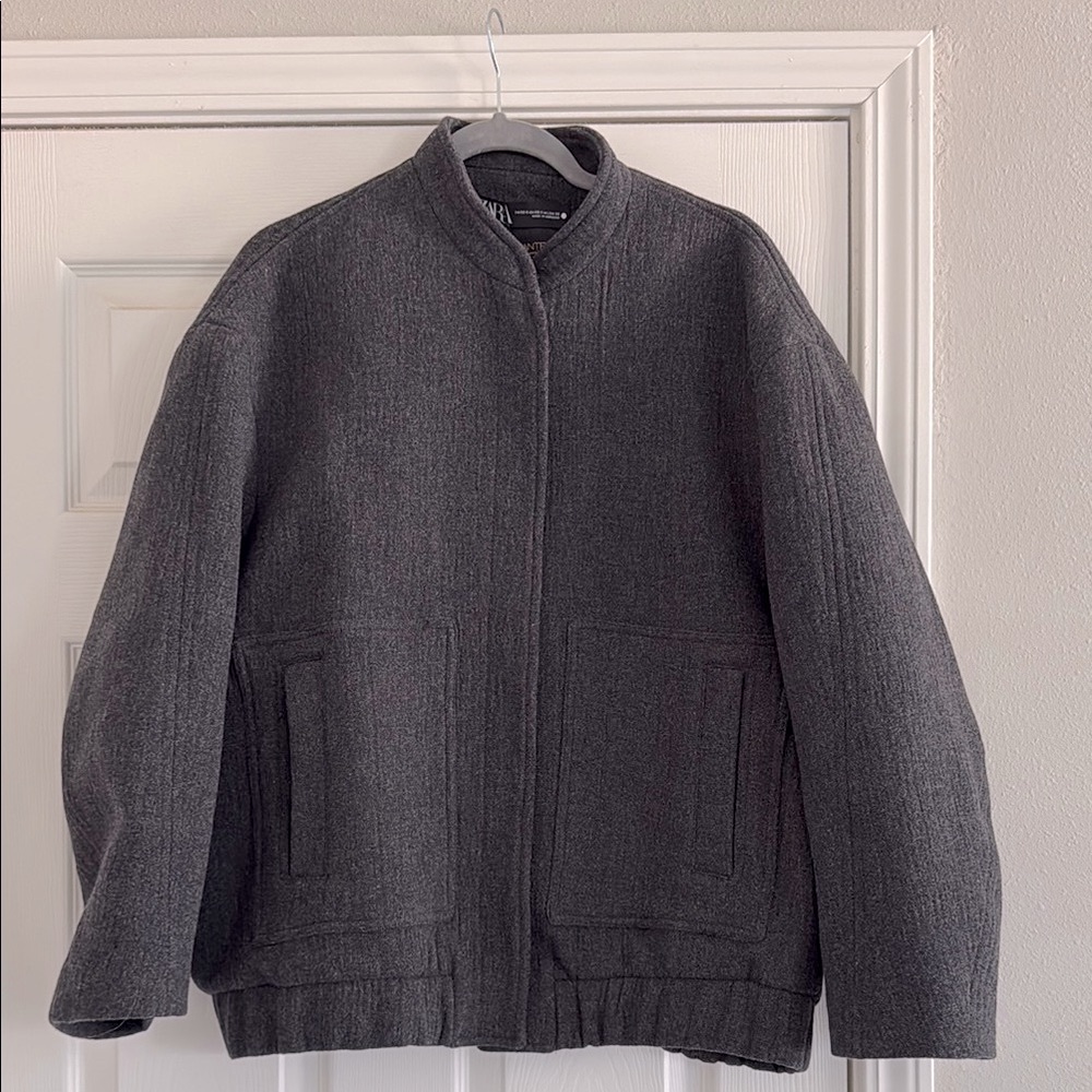 Zara Grey Bomber Jacket with Stand-Up Collar and Ribbed Cuffs.